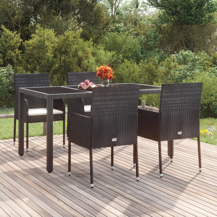 Tuinstoelen 4 st met kussens poly rattan zwart